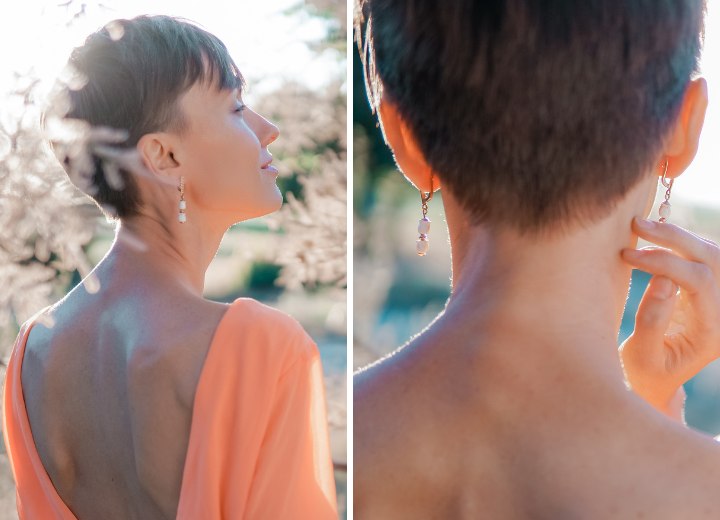 Mujer con el cabello cortado muy corto en la nuca