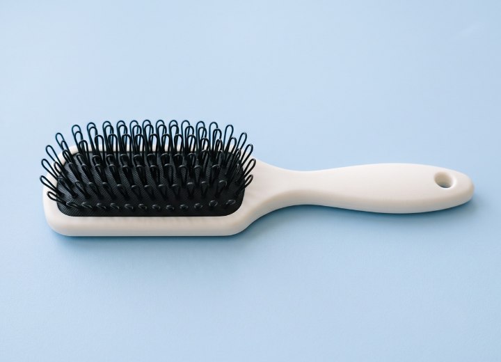 Cepillo para extensiones con p&uacute;as de bucle
